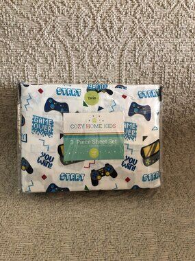 Cozy Home Kids 3piece sheet set features a vibrant video game controller pattern